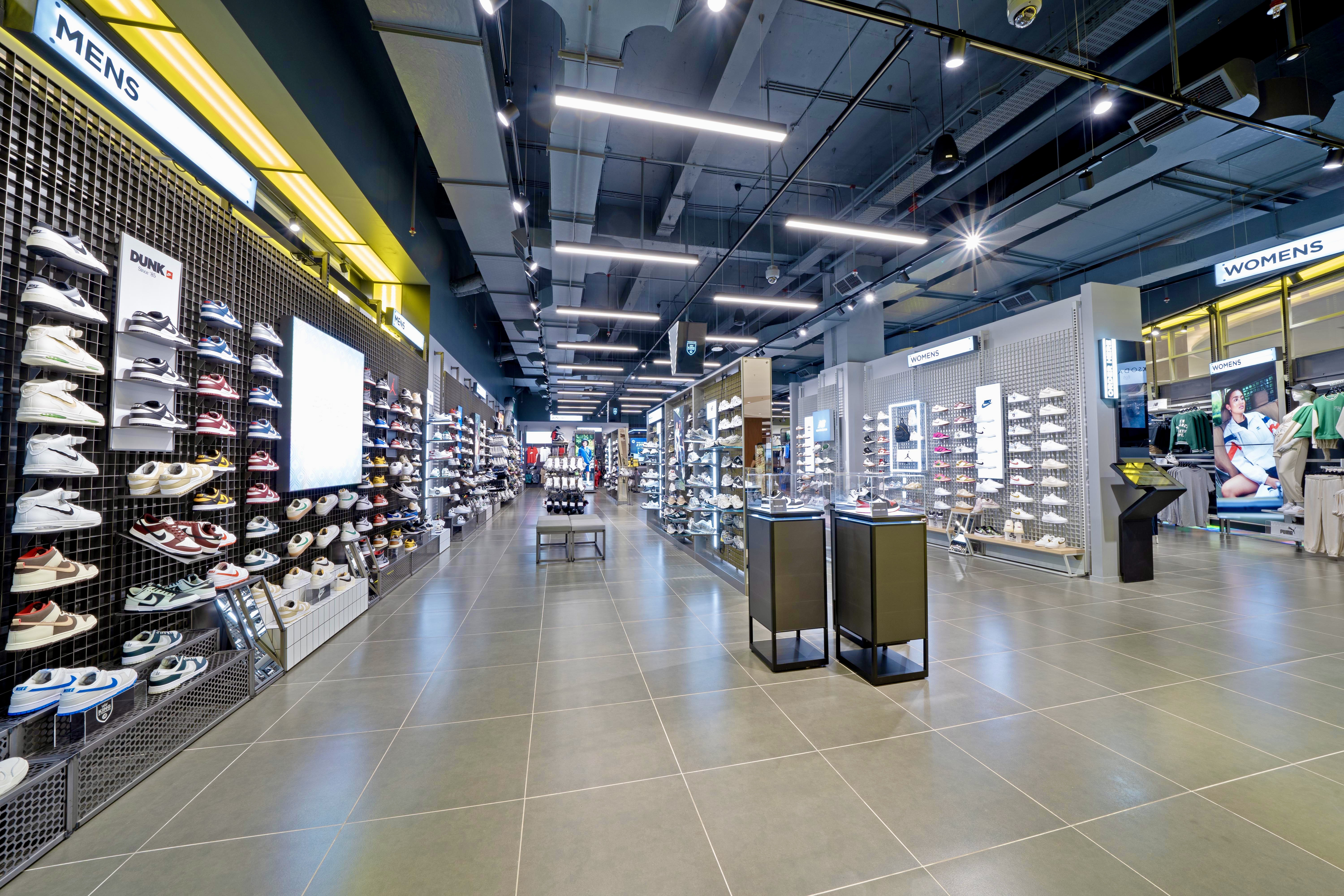Wide interior view showing circulation and footwear zoning
