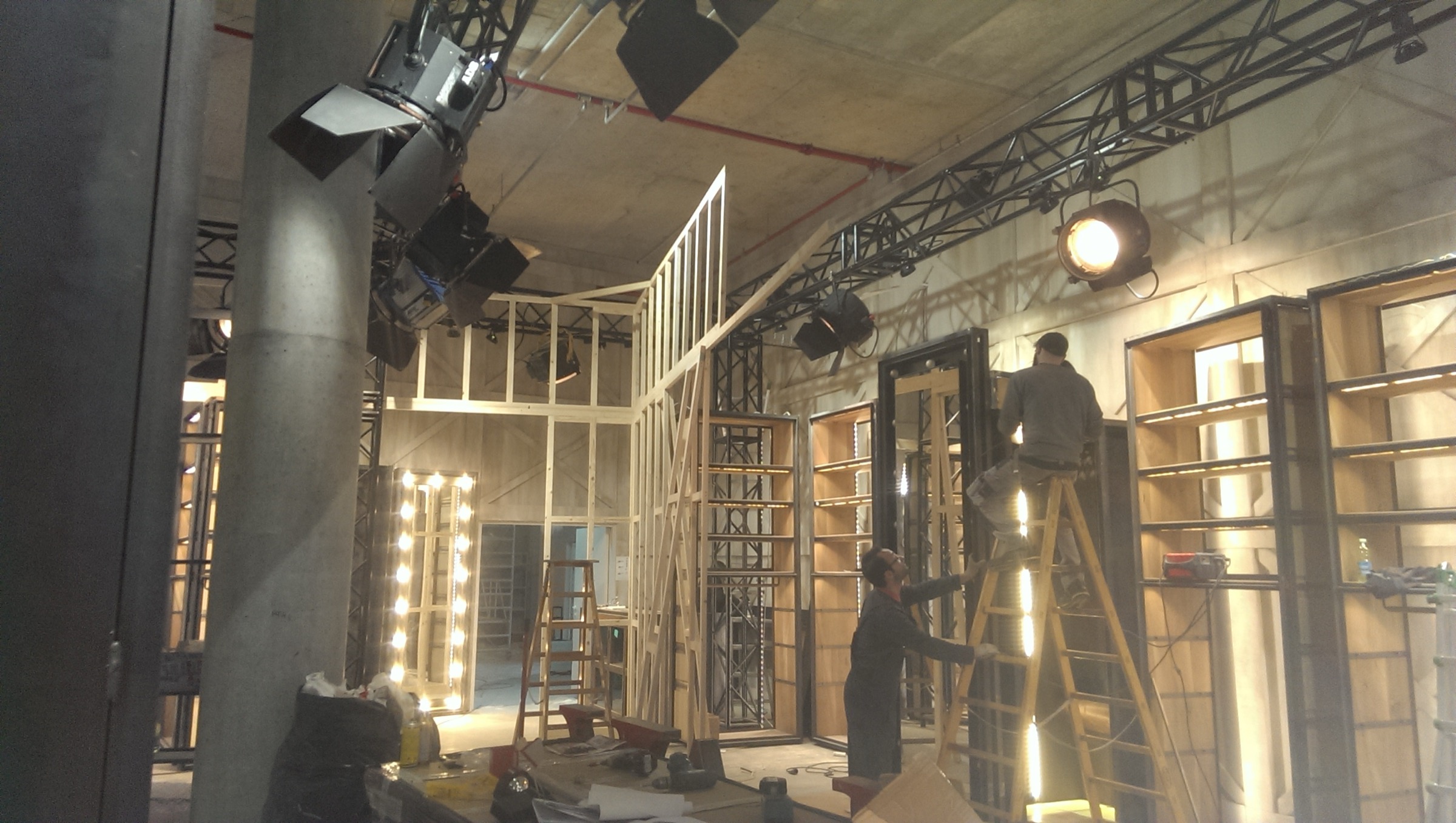 Replay Milano Temporary during construction with exposed timber and truss structures